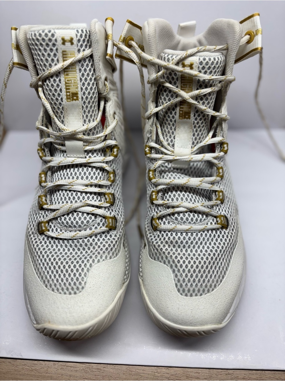 Under Armour Off-White and Gold High-Top Basketball Sneakers